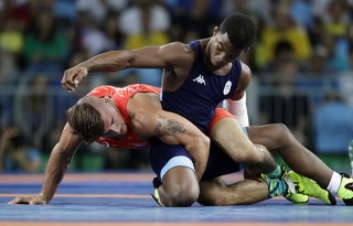 Copyright 2016 The Associated Press. All rights reserved. This material may not be published, broadcast, rewritten or redistributed without permission.Mandatory Credit: Photo by Marcio Jose Sanchez/AP/REX/Shutterstock (5837904ab)United States' Frank Molinaro, bottom, and Italy's Frank Chamiso Marquez compete during the men's 65-kg freestyle bronze medal wrestling match at the 2016 Summer Olympics in Rio de Janeiro, BrazilRio 2016 Olympic Games, Wrestling, Carioca Arena 2, Brazil - 21 Aug 2016