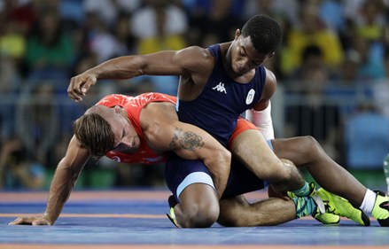 Copyright 2016 The Associated Press. All rights reserved. This material may not be published, broadcast, rewritten or redistributed without permission.Mandatory Credit: Photo by Marcio Jose Sanchez/AP/REX/Shutterstock (5837904ab)United States' Frank Molinaro, bottom, and Italy's Frank Chamiso Marquez compete during the men's 65-kg freestyle bronze medal wrestling match at the 2016 Summer Olympics in Rio de Janeiro, BrazilRio 2016 Olympic Games, Wrestling, Carioca Arena 2, Brazil - 21 Aug 2016