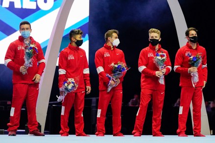 Members of the US Men's Olympic Team, Brody Malone, Yul Moldauer, Sam Mikulak and Shane Wiskus plus individual member Alec Yoder (L-R) stand on stage after the men's U.S. Olympic Gymnastics Trials, in St. Louis
US Gymnastics Olympic Trials, St. Louis, United States - 26 Jun 2021