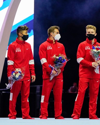 Members of the US Men's Olympic Team, Brody Malone, Yul Moldauer, Sam Mikulak and Shane Wiskus plus individual member Alec Yoder (L-R) stand on stage after the men's U.S. Olympic Gymnastics Trials, in St. Louis
US Gymnastics Olympic Trials, St. Louis, United States - 26 Jun 2021