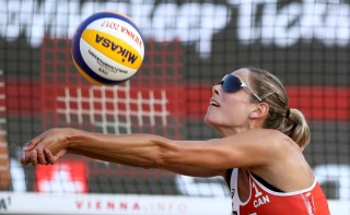 Canada's Sarah Pavan plays the ball to United States's team at the women's semi final at the Beach Volleyball World Championships in Vienna, Austria
Beach Volleyball World Championships, Vienna, Austria - 04 Aug 2017