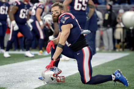 New England Patriots wide receiver Julian Edelman kneels as he warms up before an NFL football game against the Kansas City Chiefs, in Foxborough, Mass
Chiefs Patriots Football, Foxborough, USA - 08 Dec 2019