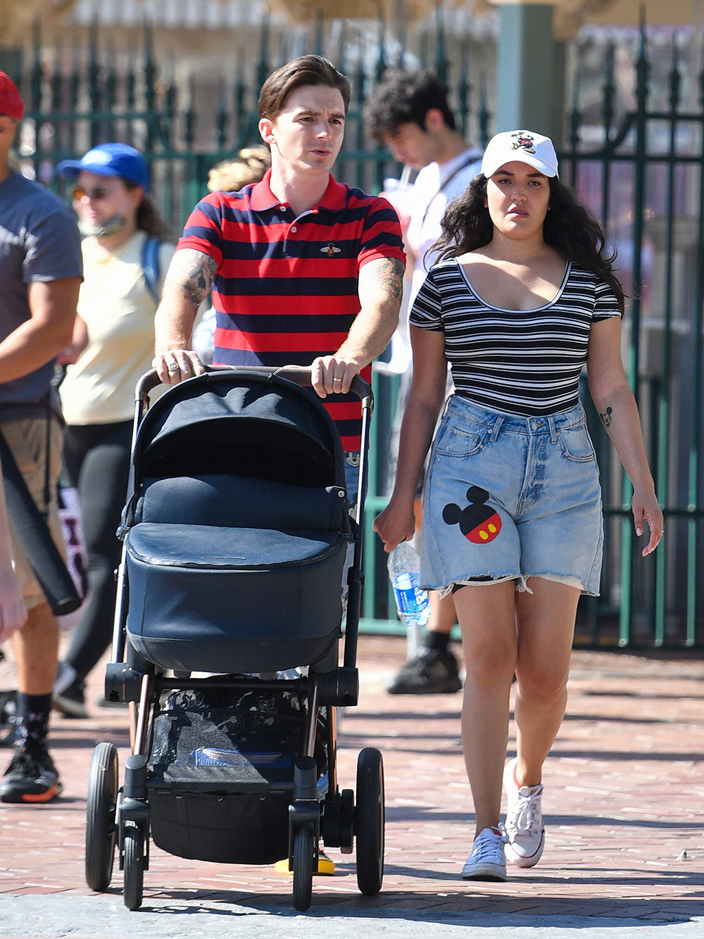 Drake Bell is seen for the first time since pleading guilty to child endangerment with a women who is believed to be his wife and a baby at Disneyland. The actor was seen celebrating his 35th birthday with his little family, putting his legal woes behind