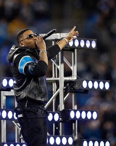 Rapper Nelly performs at halftime during a week 15 NFL football game between the Carolina Panthers and the New Orleans Saints on Monday, Dec. 17, 2018 in Charlotte, N.C. New Orleans won 12-9. (Aaron M. Sprecher via AP)