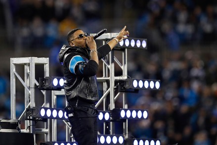 Rapper Nelly performs at halftime during a week 15 NFL football game between the Carolina Panthers and the New Orleans Saints on Monday, Dec. 17, 2018 in Charlotte, N.C. New Orleans won 12-9. (Aaron M. Sprecher via AP)