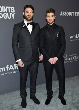 Musicians Alex Pall, left, and Andrew Taggart of The Chainsmokers attend the amfAR Gala New York AIDS research benefit at Cipriani Wall Street on Wednesday, Feb. 6, 2019, in New York. (Photo by Evan Agostini/Invision/AP)