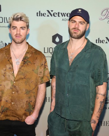The Chainsmokers, left Andrew Taggart and Alexander Pall attend the Bootsy On the Water at the Miami Seaquarium on Friday, Jan. 31,2020, in Miami, FL. (Photo by Donald Traill/Invision/AP)