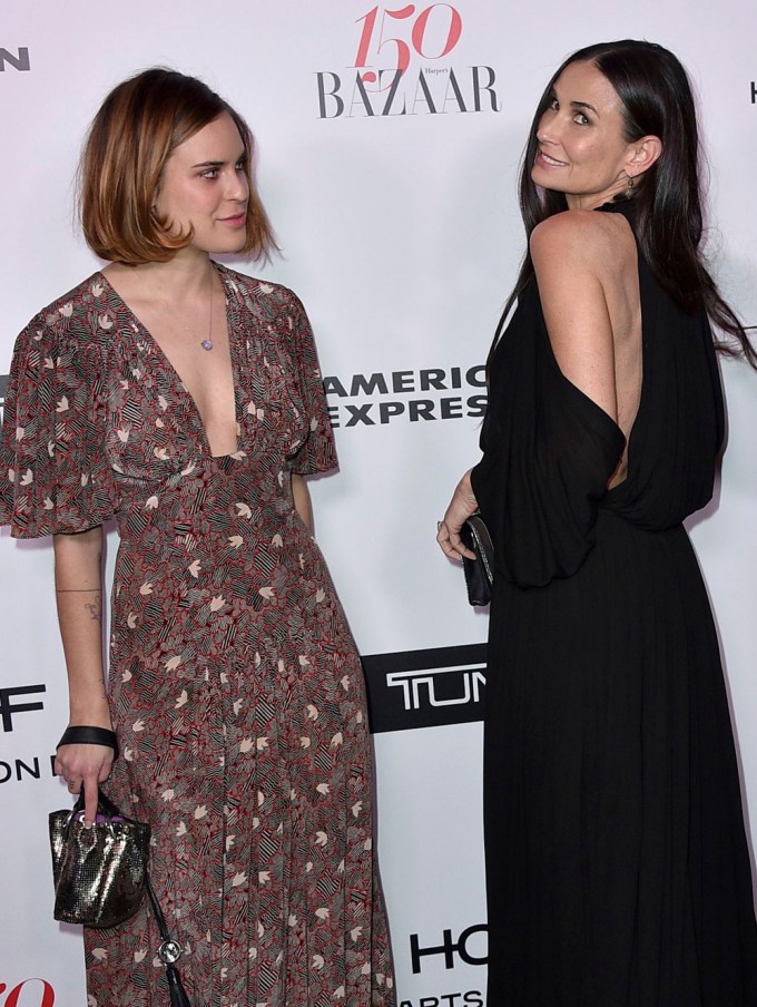 Tallulah Willis looks at mom Demi Moore on the red carpet