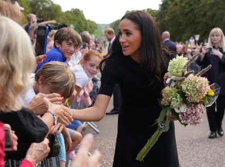 The Princess of Wales Kate Middleton, the Prince of Wales Prince William and the Duke and Duchess of Sussex Prince Harry and Meghan Markle meeting members of the public at Windsor Castle in Berkshire following the death of Queen Elizabeth II on Thursday.  10 Sep 2022 Pictured: The Duke and Duchess of Sussex and the Prince and Princess of Wales.  Meghan Markle, Prince Harry, Prince William and Kate Middleton.  Photo credit: Kirsty O'Connor/WPA-Pool/MEGA TheMegaAgency.com +1 888 505 6342 (Mega Agency TagID: MEGA894302_018.jpg) [Photo via Mega Agency]