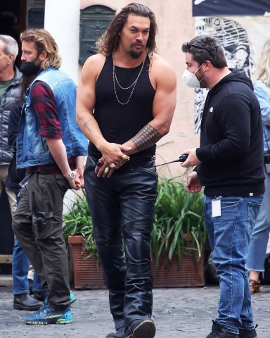 Rome, ITALY  - Actor Jason Momoa debuts as the newest cast member on the 'Fast & Furious 10' set in Rome. The stunt man helps Momoa with learning how to drive well on the motorcycle.  Pictured: Jason Momoa  BACKGRID USA 6 MAY 2022   BYLINE MUST READ: Cobra Team / BACKGRID  USA: +1 310 798 9111 / usasales@backgrid.com  UK: +44 208 344 2007 / uksales@backgrid.com  *UK Clients - Pictures Containing Children Please Pixelate Face Prior To Publication*