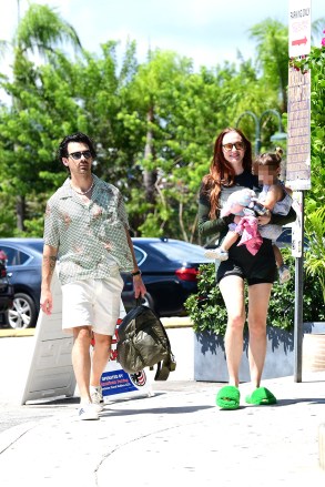 EXCLUSIVE: Joe Jonas and Sophie Turner step out for lunch in Miami. 14 Aug 2022 Pictured: Joe Jonas; Sophie Turner. Photo credit: MEGA TheMegaAgency.com +1 888 505 6342 (Mega Agency TagID: MEGA886672_004.jpg) [Photo via Mega Agency]