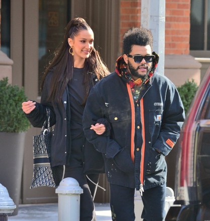 New York, NY - Model Bella Hadid and boyfriend The Weeknd are seen leaving their apartment in New York. The pair who walked arm in arm as they headed to their waiting SUV were on their way to the airport to catch a flight out of the city. Bella was sporting a Dior Handbag with her name on the side.Pictured: Bella Hadid, The WeekndBACKGRID USA 1 FEBRUARY 2019 USA: +1 310 798 9111 / usasales@backgrid.comUK: +44 208 344 2007 / uksales@backgrid.com*UK Clients - Pictures Containing ChildrenPlease Pixelate Face Prior To Publication*