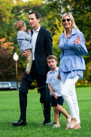 Jared Kushner (CL) and Ivanka Trump (R) walk with their children Theodore (L) and Joseph (CR) across the South Lawn as they return from a weekend stay in Bedminster, New Jersey at the White House in Washington, DC, USA , 29 July 2018. Earlier in the day, the US President Donald Trump once again went after the media on Twitter, calling them the 'enemy of the people.'  Kushners returns to the White House from Bedminster after weekend stay, Washington, USA - 29 Jul 2018