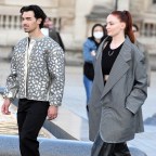 Celebrity Arrivals At Louis Vuitton Fashion Show