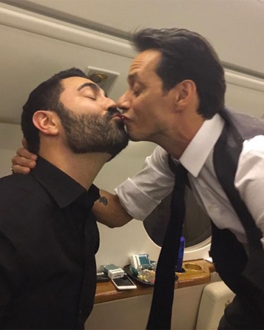 Marc Anthony Kisses Friends