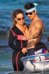 St. Barth, FRANCE  - Mariah Carey and Bryan Tanaka snap a few selfies while enjoying the warm sun as a family at Grand Cul de Sac Lagoon in St. Barth, with Mariah's two children Moroccan and Monroe. Mariah goes makeup-free in a black wetsuit as she relaxes in a clear bottom boat as her beau Bryan mans the oars.Pictured: Mariah Carey, Bryan TanakaBACKGRID USA 3 JANUARY 2019BYLINE MUST READ: Revolver / BACKGRIDUSA: +1 310 798 9111 / usasales@backgrid.comUK: +44 208 344 2007 / uksales@backgrid.com*UK Clients - Pictures Containing Children
Please Pixelate Face Prior To Publication*
