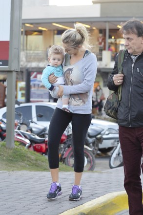** RESTRICTIONS: ONLY UNITED STATES ** Buenos Aires,  - ©2014 RAMEY PHOTO 310-828-3445

*NO ARGENTINA*

Buenos Aires, June 01, 2014

Michael Buble's wife LUISANA LOPILATO takes their son NOAH BUBLE out shopping with her family in Buenos Aires.



PGpn-fed7 *** Local Caption *** x 

AKM-GSI 1 JUNE 2014 

To License These Photos, Please Contact :

 Maria Buda
 (917) 242-1505
 mbuda@akmgsi.com

or
  
Mark Satter
 (317) 691-9592
 msatter@akmgsi.com
 sales@akmgsi.com