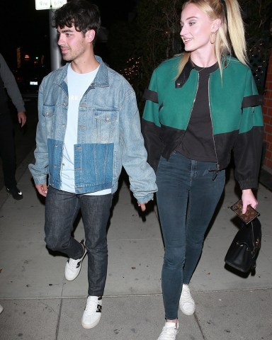 Beverly Hills, CA - The Jonas Brothers Nick, Joe, Kevin and little brother Frankie (Bonus Jonas) dine with Sophie Turner and Danielle Jonas at Mr Chow in Beverly Hills.Pictured: Joe Jonas, Sophie TurnerBACKGRID USA 29 APRIL 2019 BYLINE MUST READ: NGRE / BACKGRIDUSA: +1 310 798 9111 / usasales@backgrid.comUK: +44 208 344 2007 / uksales@backgrid.com*UK Clients - Pictures Containing ChildrenPlease Pixelate Face Prior To Publication*