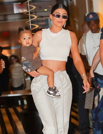 A day after the Met-Gala 2019 Kylie Jenner showed off her toned tummy with Stormi on her hip, Travis Scott was right behind her as they headed to the private airport.  Image: Stormi Webster, Kylie Jenner, Travis ScottRef: SPL5087329 070519 Non-Exclusive Image by: Felipe Ramless/SplashNews.comSplash News & PhotosLos Angeles: 310-821-2666New York: 212-619-2666London: 0207 644 7656splashnewsphotok 439985newsphotodes 02 02 .comworld rights