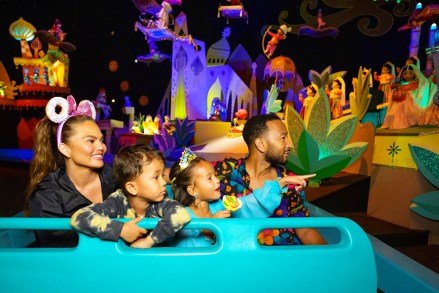 Chrissy Teigen, John Legend and their kids, Luna and Miles, enjoy a whimsical voyage on 'it's a small world' at Disneyland Park in Anaheim, Calif., April 14, 2022, complete with a cast of nearly 300 audio-animatronics dolls representing children from every corner of the globe singing the classic anthem.
Chrissy Teigen and John Legend celebrate Daughter Luna's Birthday at Disneyland Resort, Anaheim, California, USA - 14 Apr 2022