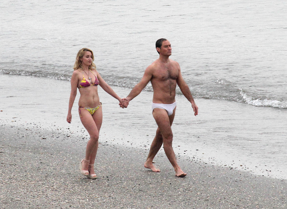 EXCLUSIVE: Jude Law and French actress Ludovine Seigner filming "The New Pope" on the beach in Venice, directed by Paolo Sorrentino