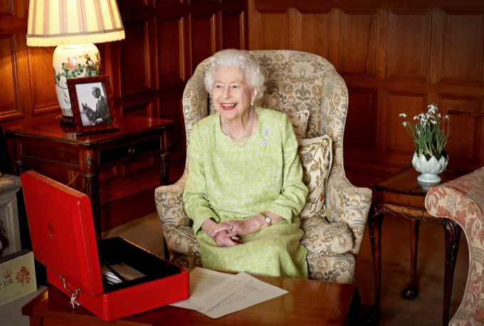 Queen Elizabeth II Sits In Her Study