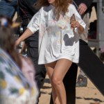 Millie Bobby Brown hits the beach as she films a scene for her new movie 'Electric State'. The British actress, 18, was seen in a white T-shirt as she walked across the sand during filming in Acworth, Georgia. 24 Oct 2022 Pictured: Millie Bobby Brown. Photo credit: OG/MEGA TheMegaAgency.com +1 888 505 6342 (Mega Agency TagID: MEGA910806_016.jpg) [Photo via Mega Agency]