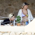 *EXCLUSIVE* 'Stranger Things' actress Millie Bobby Brown sports a ring while enjoying her getaway with boyfriend Jake Bongiovi in Sardinia