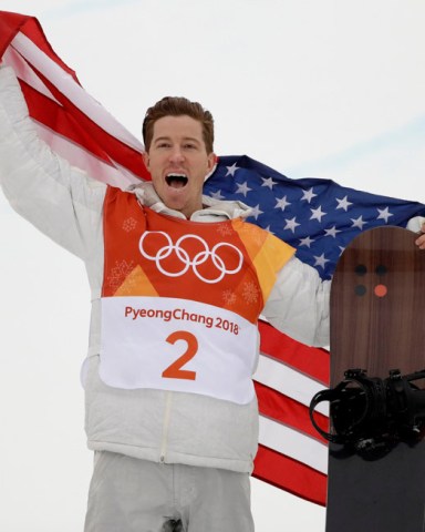 Shaun White, of the United States, celebrates his gold medal after the men's halfpipe finals at Phoenix Snow Park at the 2018 Winter Olympics in Pyeongchang, South Korea Olympics Snowboard Men, Pyeongchang, South Korea - 14 Feb 2018