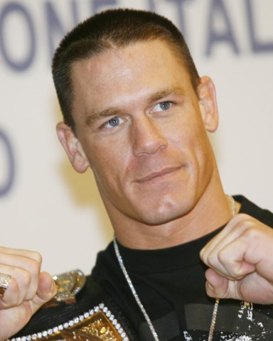 World wrestling entertainment superstar John Cena poses for photographers, prior to a press conference in San Remo, Italy, Thursday, March 2, 2006.  John Cena is one of the international guest stars featuring in the "Festival di Sanremo" show, running on Italian State TV RAI through Saturday, March 4. (AP Photo/Luca Bruno)
