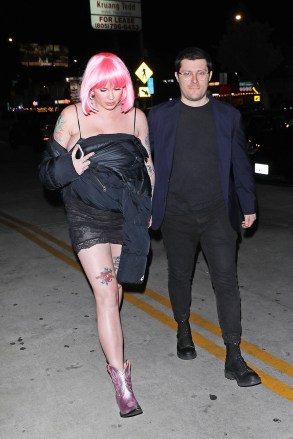 Hollywood, CA  - *EXCLUSIVE*  - A pregnant Ireland Baldwin rocks a pink wig as she and boyfriend RAC are seen arriving at an adult entertainment club called Jumbo's Clown Room to celebrate her baby shower with celebrity friends such as Hilary Duff, Rumer Willis, mom Kim Basinger and many other friends as well in Hollywood. The 27-year-old mom to be is wearing a see through lingerie, pink cowboy style boots and a pink wig. At one point, you can clearly see Ireland's pink under garment through the back of her lingerie as she walks into the club. The Jumbo's Clown Room is usually closed on Monday's but certain arrangements were made for it to be open for Ireland Baldwin's baby shower celebration.

Pictured: Ireland Baldwin, RAC

BACKGRID USA 7 MARCH 2023 

USA: +1 310 798 9111 / usasales@backgrid.com

UK: +44 208 344 2007 / uksales@backgrid.com

*UK Clients - Pictures Containing Children
Please Pixelate Face Prior To Publication*