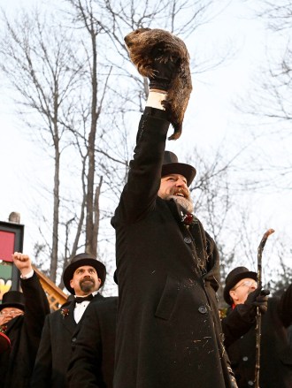 Groundhog Club handler A.J. Dereume holds Punxsutawney Phil, the weather prognosticating groundhog, during the 137th celebration of Groundhog Day on Gobbler's Knob in Punxsutawney, Pa., . Phil's handlers said that the groundhog has forecast six more weeks of winter
Groundhog Day, Punxsutawney, United States - 02 Feb 2023