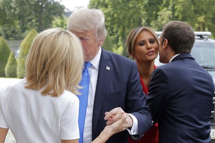 MAXPPP OUTMandatory Credit: Photo by MICHEL EULER/POOL/EPA/REX/Shutterstock (8960077h)Emmanuel Macron, Melania Trump, Brigitte Macron and Donald J. TrumpDonald J. Trump's visit to Paris, France - 13 Jul 2017French President Emmanuel Macron (R) welcomes First Lady Melania Trump (2-R) while his wife Brigitte (L) welcomes US President Donald J. Trump at Les Invalides museum in Paris, France, 13 July 2017. President Trump and French President Macron planned to meet 13 July in Paris to focus on issues where they can take US-French relations forward, with major security and defense topics among them.