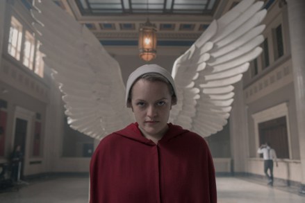 The Handmaid's Tale -- "Household" - Episode 306 - June accompanies the Waterfords to Washington DC, where a powerful family offers a glimpse into the future of Gilead.  June makes an important connection while trying to protect Nichole.  June (Elisabeth Moss), featured.  (Photo by: Sophie Giraud/Hulu)