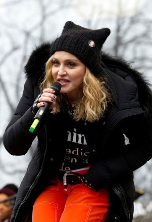 Madonna performs on stage during the women's march rally, in Washington. In a global exclamation of defiance and solidarity, more than 1 million people rallied at women's marches in the nation's capital and cities around the world Saturday to send President Donald Trump an emphatic message on his first full day in office that they won't let his agenda go unchallenged
Trump Womens March, Washington, USA - 21 Jan 2017