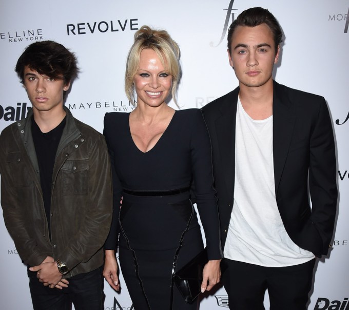 Pamela Anderson smiles with her sons
