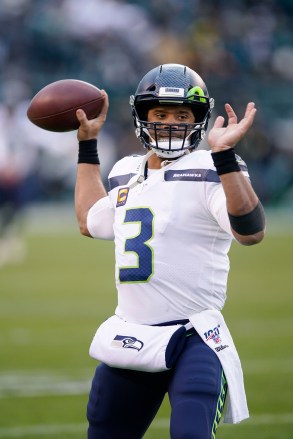 Seattle Seahawks' Russell Wilson warms up before an NFL wild-card playoff football game against the Philadelphia Eagles, in Philadelphia
Seahawks Eagles Football, Philadelphia, USA - 05 Jan 2020