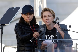Scarlett Johansson, Mila Kunis. Actress Scarlett Johansson, right, speaks as Mila Kunis holds a microphone for her at a Women's March against sexual violence and the policies of the Trump administration, in Los Angeles
Womens March , Los Angeles, USA - 20 Jan 2018