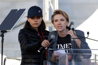 Scarlett Johansson, Mila Kunis. Actress Scarlett Johansson, right, speaks as Mila Kunis holds a microphone for her at a Women's March against sexual violence and the policies of the Trump administration, in Los Angeles
Womens March , Los Angeles, USA - 20 Jan 2018