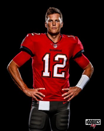 First appearance of Tom Brady in the new Tampa Bay Buccaneers uniform.  The 42-year-old NFL quarterback is now playing for his new team wearing the number 12 shirt after spending 20 years with the New England Patriots. Brady will join fellow Buccaneers, including wide receivers Mike Evans and Chris Godwin, tight ends Rob Gronkowski, OJ Howard and Cameron Blate. In his 20 years with the New England Patriots, Brady won 6 Super Bowl titles and 3 of his NFL MVPs, was named to the Pro Bowl 14 times, and made the First Team All-Pro. was selected three times.  June 16, 2020 Photo: First appearance of Tom Brady in a Tampa Bay Buccaneers uniform. Photo Credit: Tampa Bay Buccaneers/ MEGA TheMegaAgency.com +1 888 505 6342 (Mega Agency TagID: MEGA681209_001.jpg) [Photo via Mega Agency]