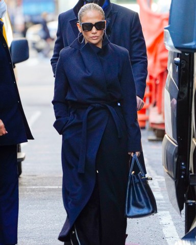 Jennifer Lopez and Alex Rodriguez wear matching coats while departing their apartment in New YorkPictured: Jennifer Lopez,Alex RodriguezRef: SPL5202353 101220 NON-EXCLUSIVEPicture by: Jackson Lee / SplashNews.comSplash News and PicturesUSA: +1 310-525-5808London: +44 (0)20 8126 1009Berlin: +49 175 3764 166photodesk@splashnews.comWorld Rights, No Portugal Rights