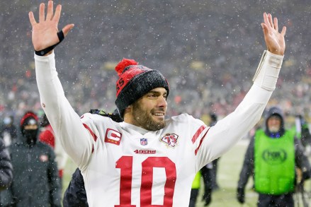 San Francisco 49ers' Jimmy Garoppolo celebrates after an NFC divisional playoff NFL football game, in Green Bay, Wis. The 49ers won 13-10 to advance to the NFC Chasmpionship game
49ers Packers Football, Green Bay, United States - 22 Jan 2022