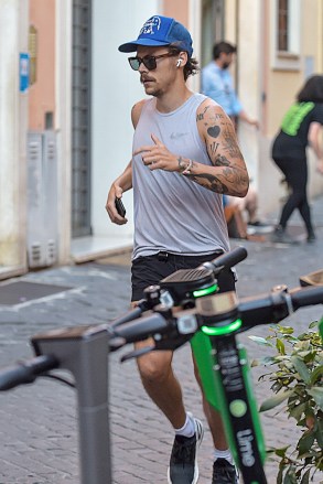 Exclusive: * 2330 BST No web until August 1st * Harry Styles sports new facial hair while jogging in Rome. July 24, 2020 Photo: Harry Styles. Photo provider: MEGA TheMegaAgency.com +1 888 505 6342 (Mega Agency TagID: MEGA690650_001.jpg) [Photo via Mega Agency]