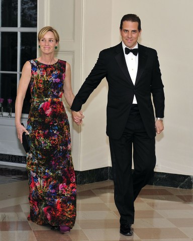 No New York or New Jersey newspapers or newspapers within a 75 mile radius of New York City.
Mandatory Credit: Photo by REX/Shutterstock (8477768c)
Hunter Biden and Kathleen Biden arrive for the Official Dinner in honor of Prime Minister David Cameron of Great Britain and his wife, Samantha, at the White House in Washington, D.C.
Official Dinner in honor of Prime Minister David Cameron, White House, Washington DC, USA - 14 Mar 2012