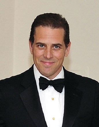 No New York or New Jersey newspapers or newspapers within a 75 mile radius of New York City.Mandatory Credit: Photo by REX/Shutterstock (8477768a)Hunter Biden arrives with his wife, Kathleen Biden, for the Official Dinner in honor of Prime Minister David Cameron of Great Britain and his wife, Samantha, at the White House in Washington, D.C.. It was reported on Thursday, that Hunter is in a relationship with his late brother Beau's wife, Hallie, following separation from his wife, Kathleen, in late 2015.Official Dinner in honor of Prime Minister David Cameron, White House, Washington DC, USA - 14 Mar 2012