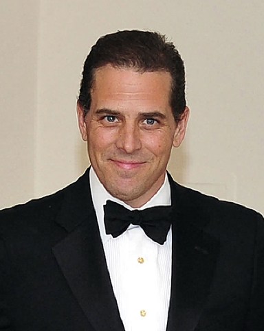 No New York or New Jersey newspapers or newspapers within a 75 mile radius of New York City.
Mandatory Credit: Photo by REX/Shutterstock (8477768a)
Hunter Biden arrives with his wife, Kathleen Biden, for the Official Dinner in honor of Prime Minister David Cameron of Great Britain and his wife, Samantha, at the White House in Washington, D.C.. It was reported on Thursday, that Hunter is in a relationship with his late brother Beau's wife, Hallie, following separation from his wife, Kathleen, in late 2015.
Official Dinner in honor of Prime Minister David Cameron, White House, Washington DC, USA - 14 Mar 2012