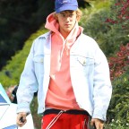 Justin Bieber shows off his underwear and new car on his birthday while arriving to a friends