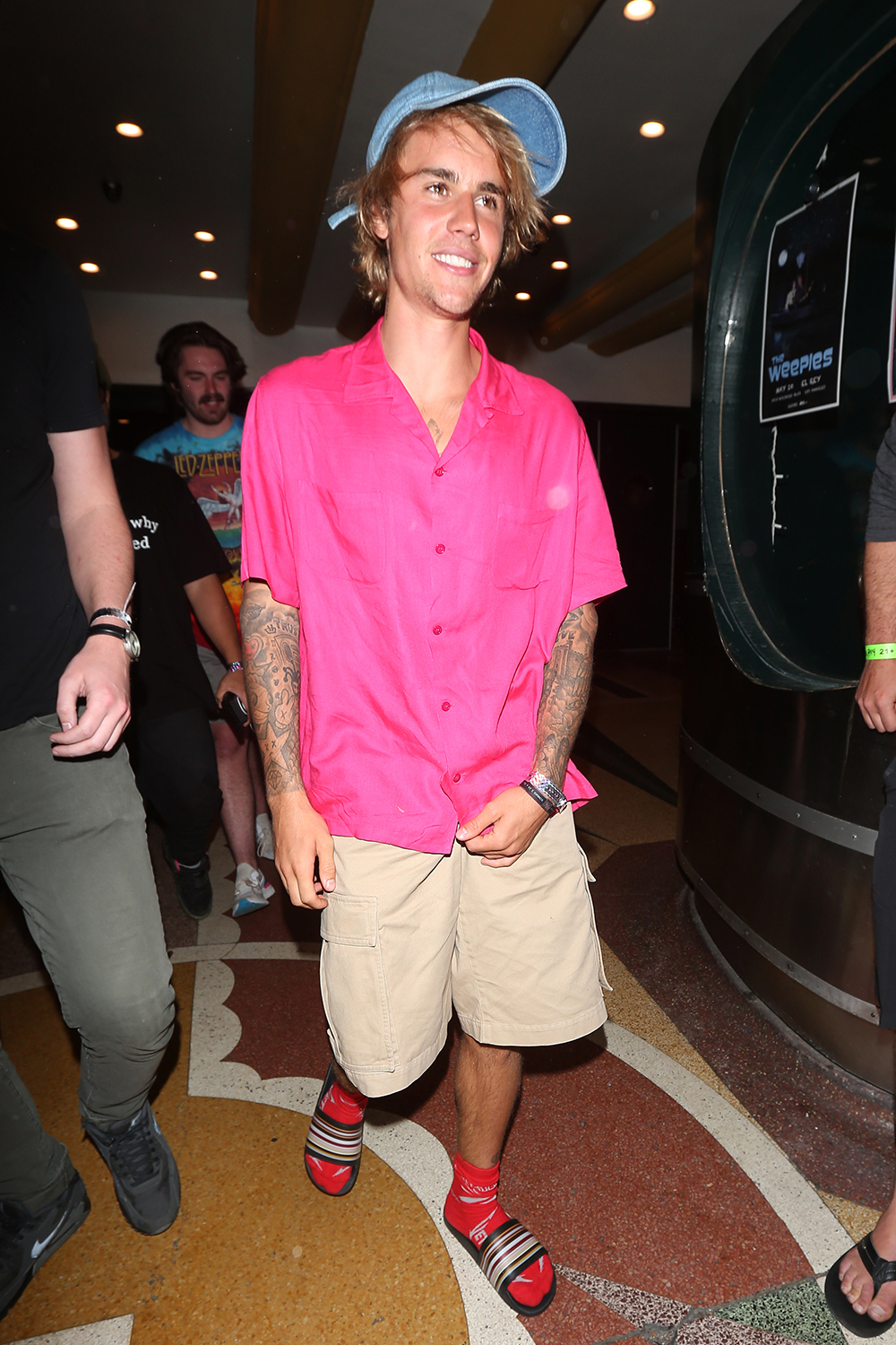 Justin Bieber wears a pink shirt with slippers as he leaves the El Rey Theatre after watching Adam Sandler perform his most recent stand up comedy sketch in Los Angeles

Pictured: Justin Bieber
Ref: SPL1681249  110418  
Picture by: Photographer Group / Splash News

Splash News and Pictures
Los Angeles:310-821-2666
New York:212-619-2666
London:870-934-2666
photodesk@splashnews.com