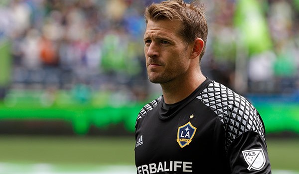 Los Angeles Galaxy goalkeeper Dan Kennedy walks on the pitch before an MLS soccer match against the Seattle Sounders, Saturday, July 9, 2016 in Seattle. (AP Photo/Ted S. Warren)