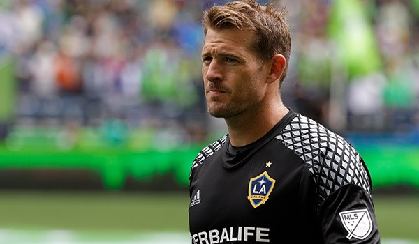 Los Angeles Galaxy goalkeeper Dan Kennedy walks on the pitch before an MLS soccer match against the Seattle Sounders, Saturday, July 9, 2016 in Seattle. (AP Photo/Ted S. Warren)